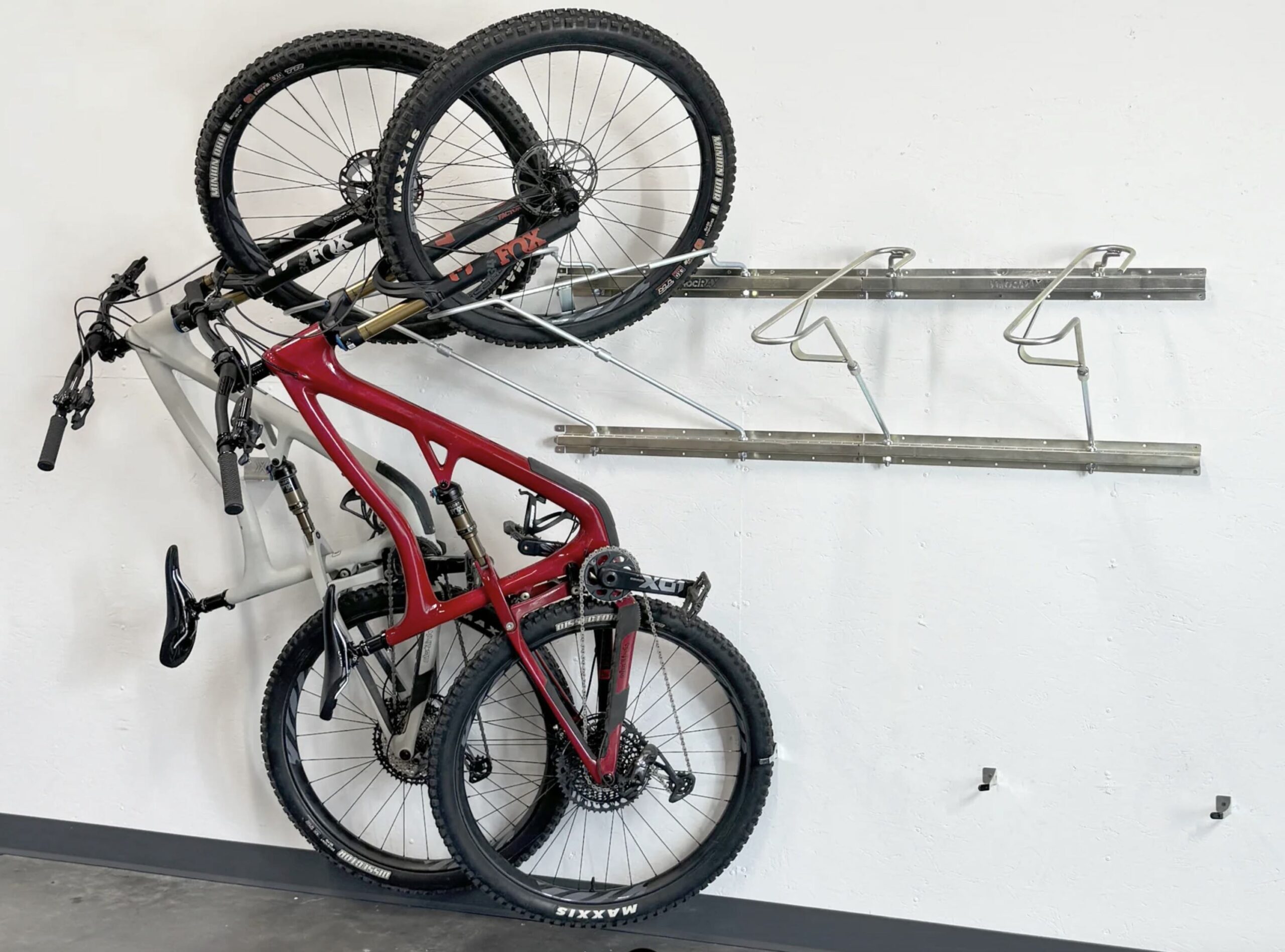 Garage wall bike storage hooks for spring gear