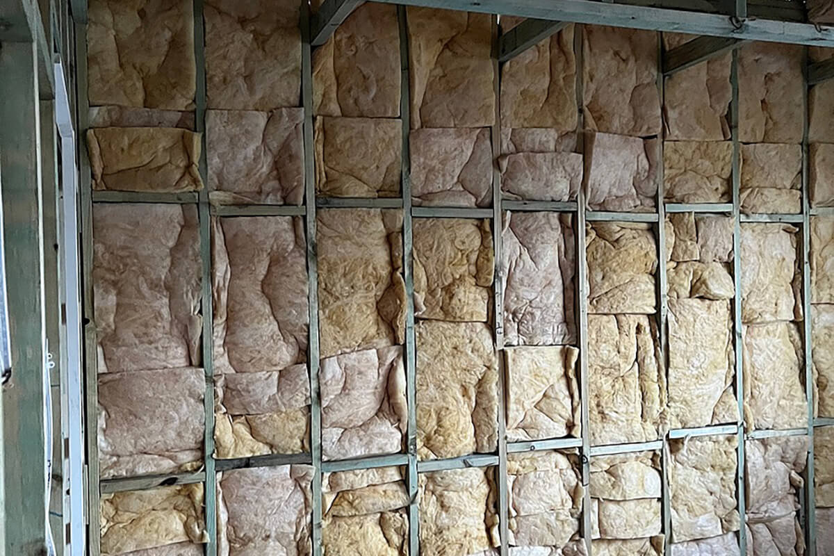 Basement rim joist insulation to reduce cold floors in Edmonton